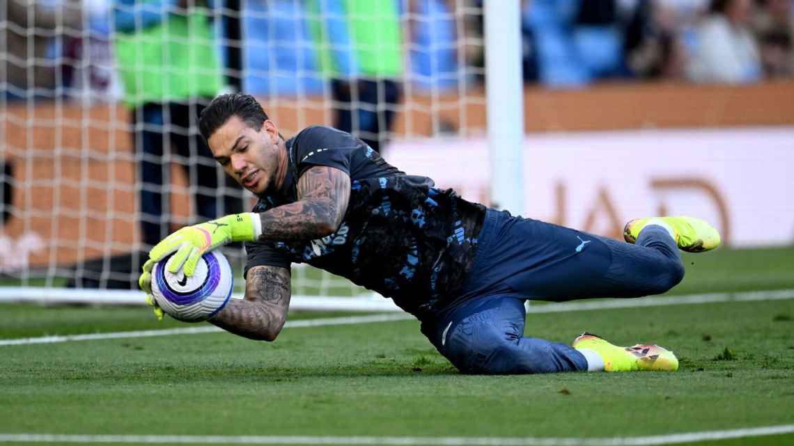 Ederson stands in front of Man City 1