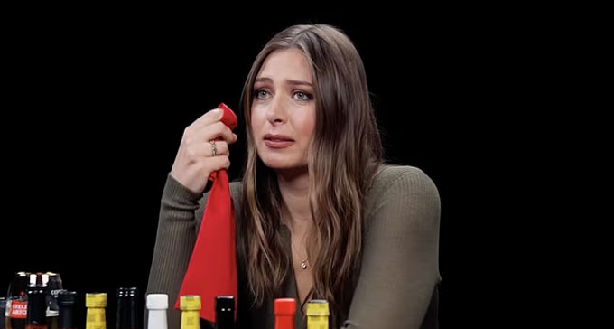 Sharapova tears when participating in the challenge with super spicy chicken wings