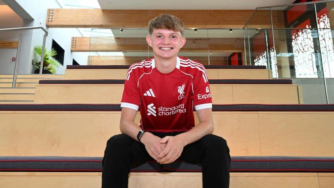 Will Wright signed a 3 -year contract with Liverpool